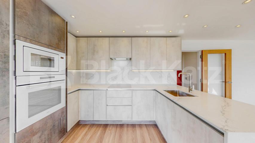 A stunning fully renovated three-bedroom apartment finished to an exceptional high standard throughout The Oaks, London, NW6,  The Oaks