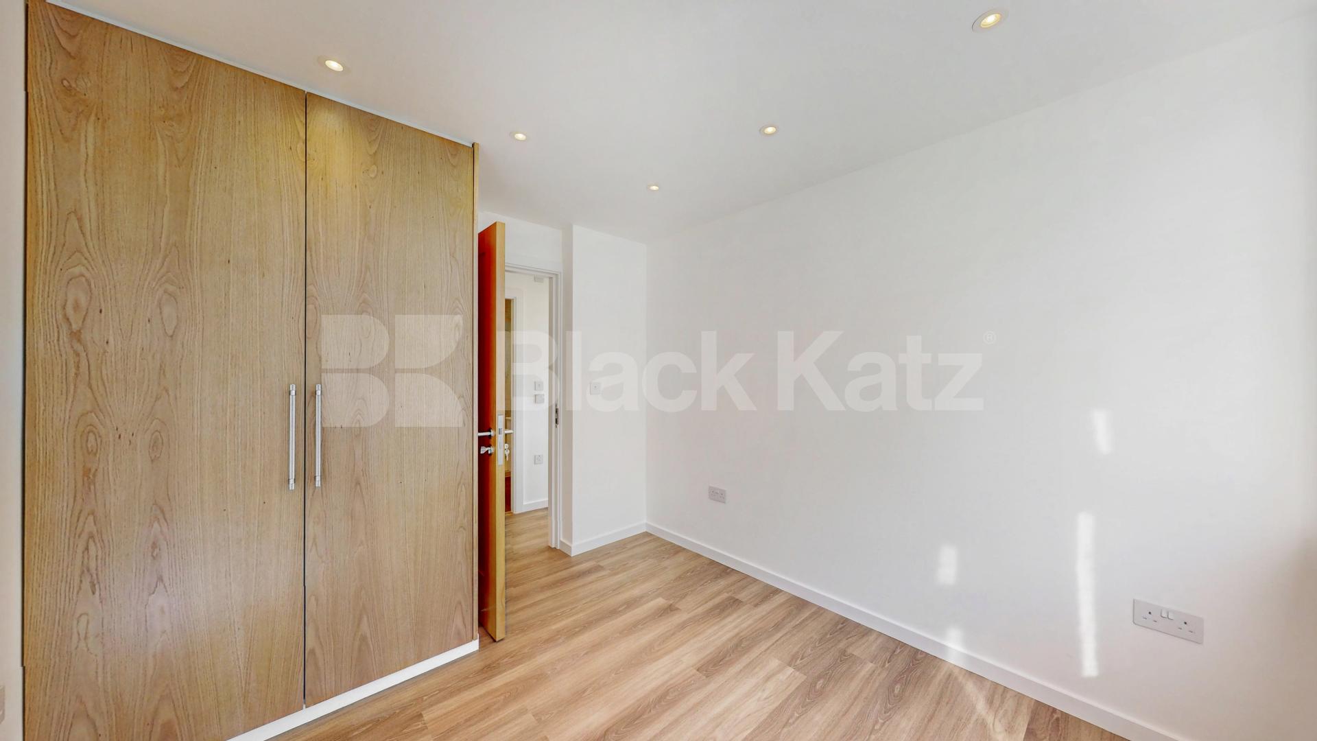 A stunning fully renovated three-bedroom apartment finished to an exceptional high standard throughout The Oaks, London, NW6,  The Oaks