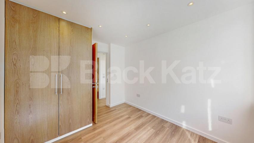 A stunning fully renovated three-bedroom apartment finished to an exceptional high standard throughout The Oaks, London, NW6,  The Oaks