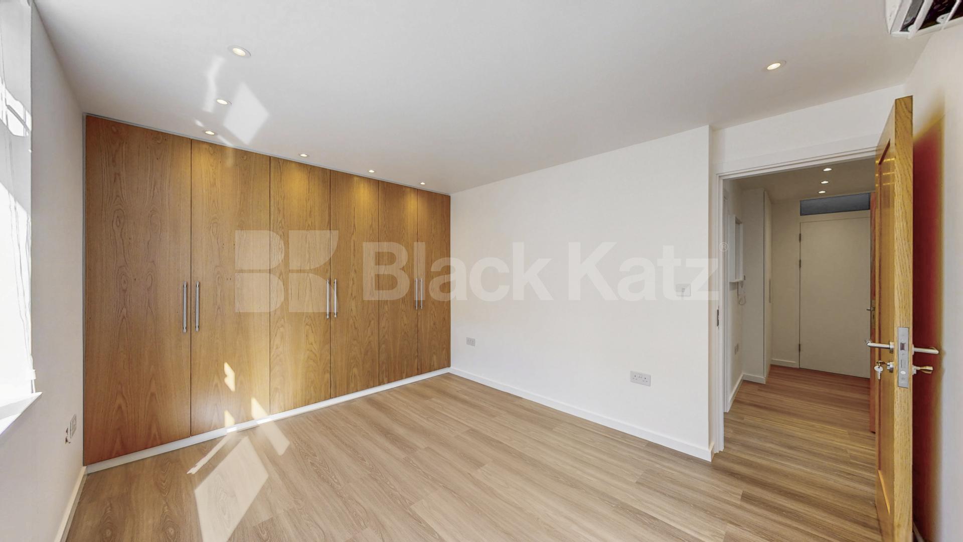 A stunning fully renovated three-bedroom apartment finished to an exceptional high standard throughout The Oaks, London, NW6,  The Oaks