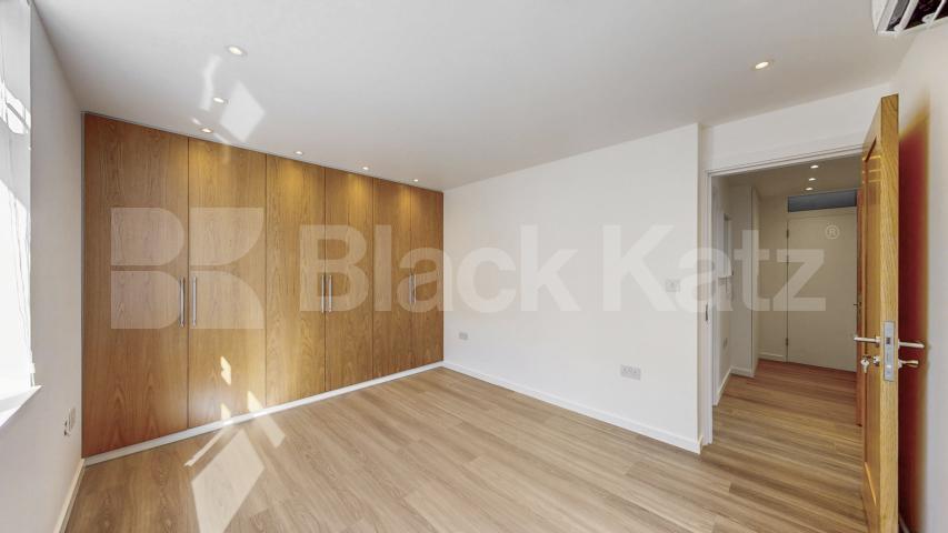 A stunning fully renovated three-bedroom apartment finished to an exceptional high standard throughout The Oaks, London, NW6,  The Oaks