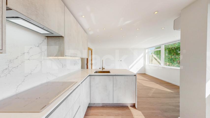 A stunning fully renovated three-bedroom apartment finished to an exceptional high standard throughout The Oaks, London, NW6,  The Oaks