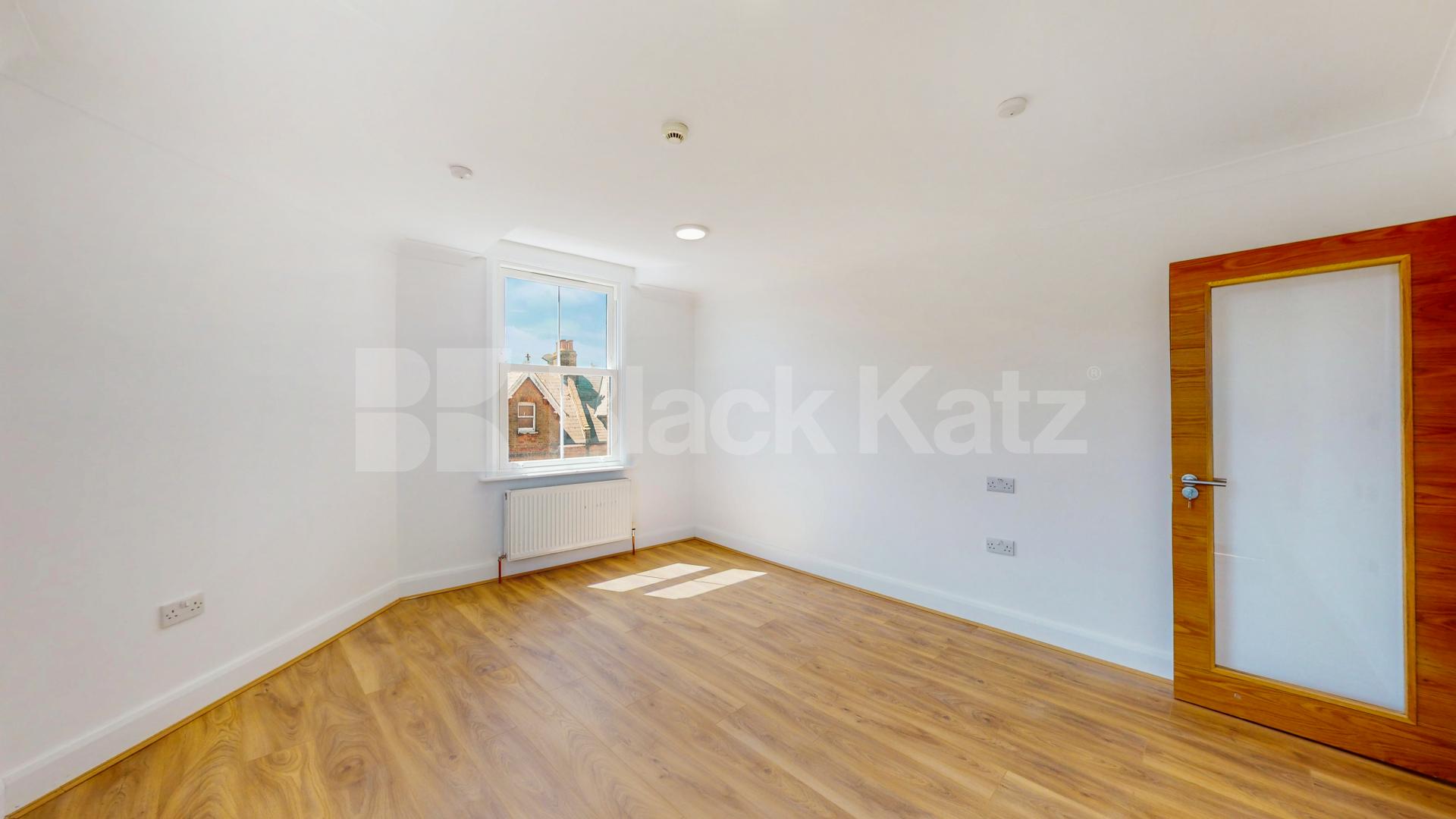 A spacious and beautifully renovated three-bedroom property offering generous living accommodation in a prime Willesden Green location High Road, London, NW10,  London