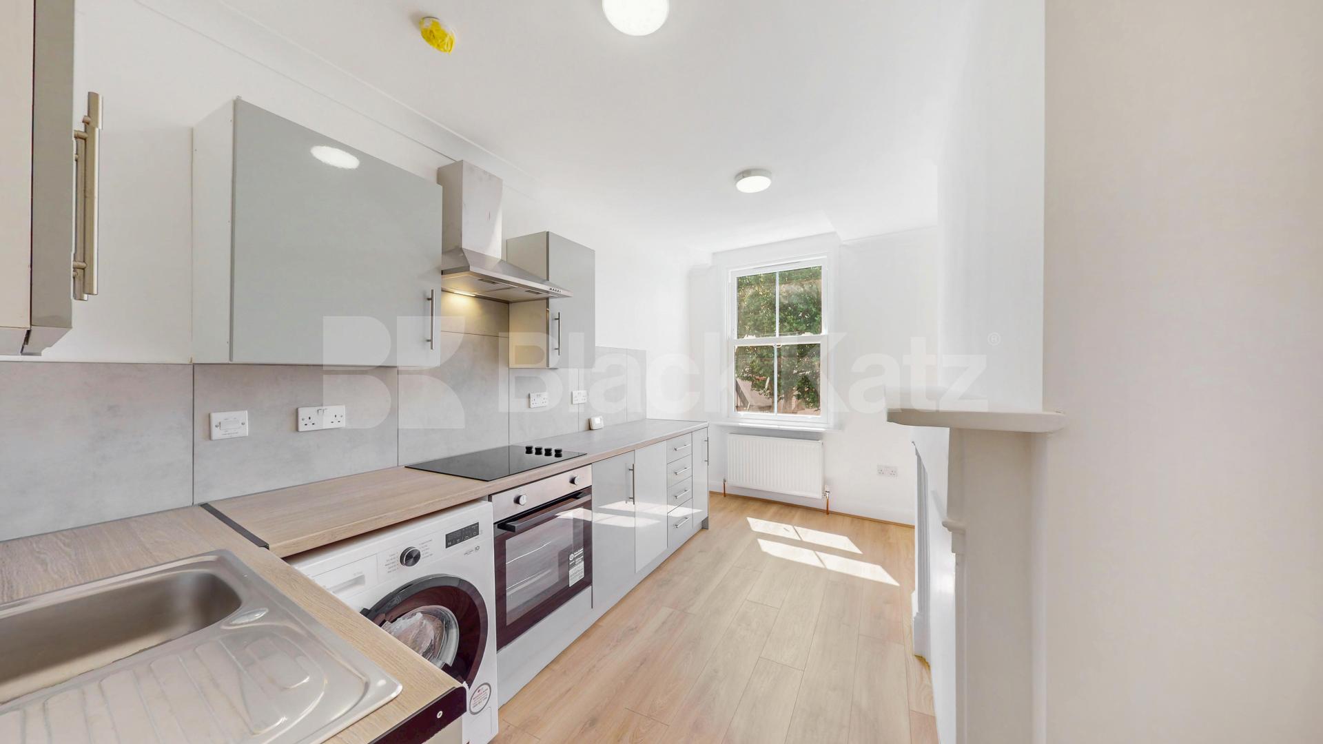 A spacious and beautifully renovated three-bedroom property offering generous living accommodation in a prime Willesden Green location High Road, London, NW10,  London