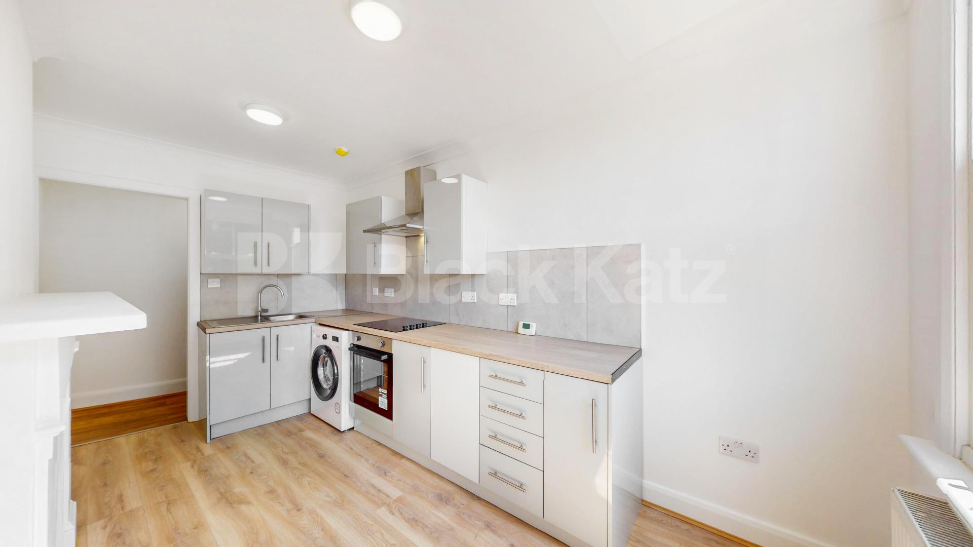 A spacious and beautifully renovated three-bedroom property offering generous living accommodation in a prime Willesden Green location High Road, London, NW10,  London