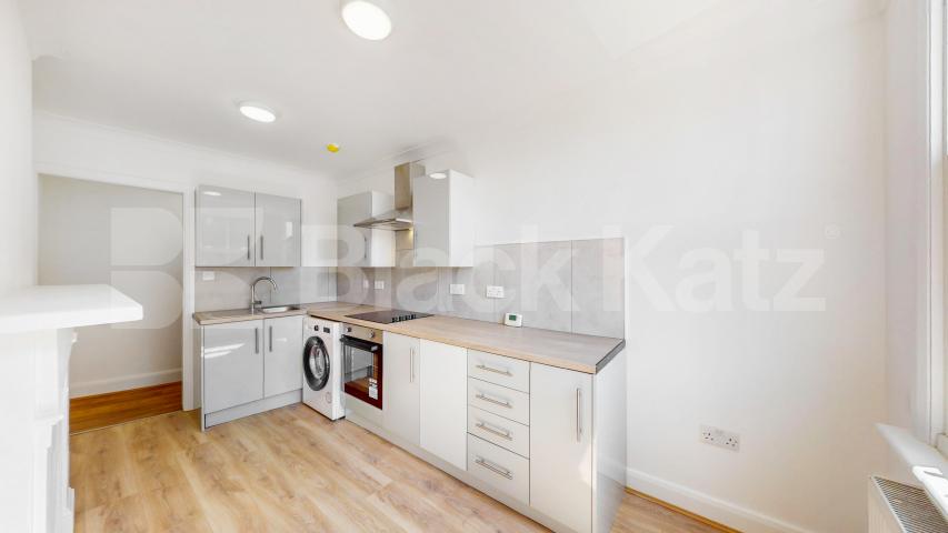 A spacious and beautifully renovated three-bedroom property offering generous living accommodation in a prime Willesden Green location High Road, London, NW10,  London