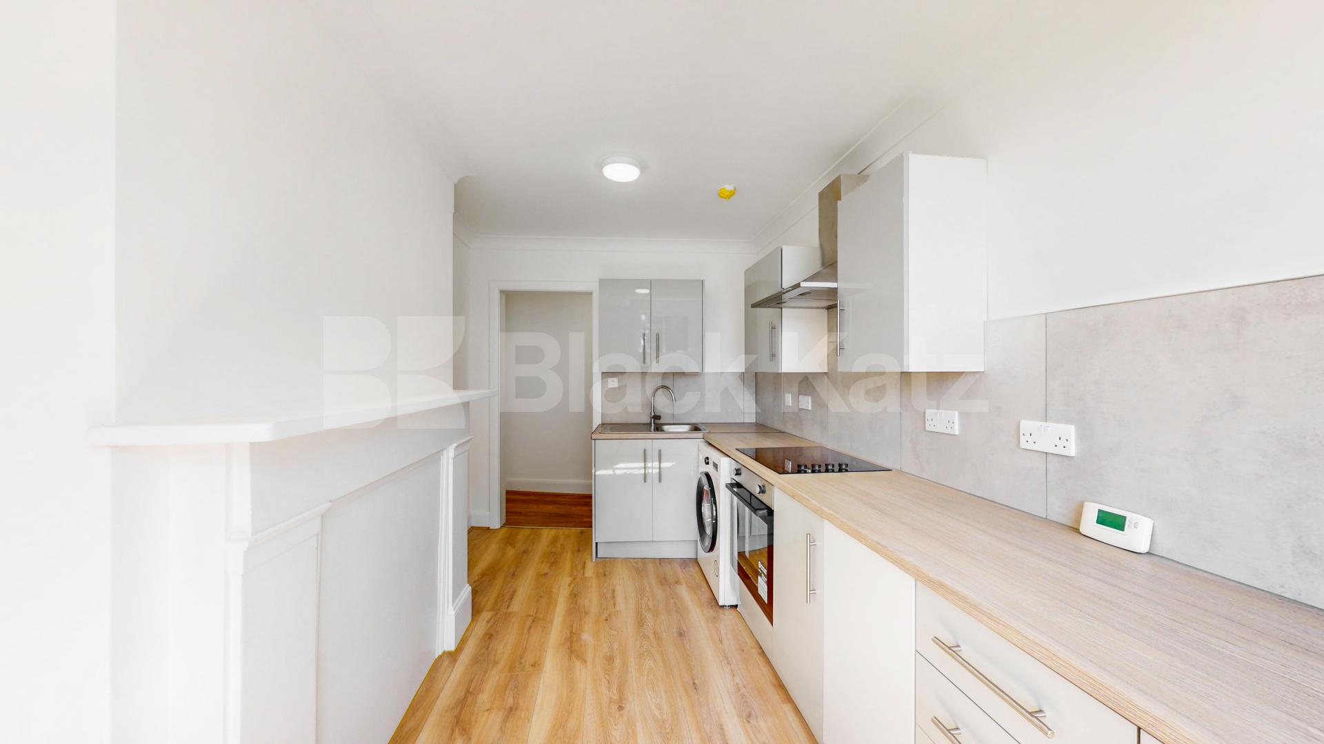 A spacious and beautifully renovated three-bedroom property offering generous living accommodation in a prime Willesden Green location High Road, London, NW10,  London
