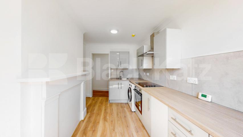 A spacious and beautifully renovated three-bedroom property offering generous living accommodation in a prime Willesden Green location High Road, London, NW10,  London