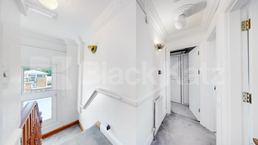 A well-presented three-bedroom split-level apartment located on Finchley Road, NW3 Finchley Road, Hampstead, NW3,  London