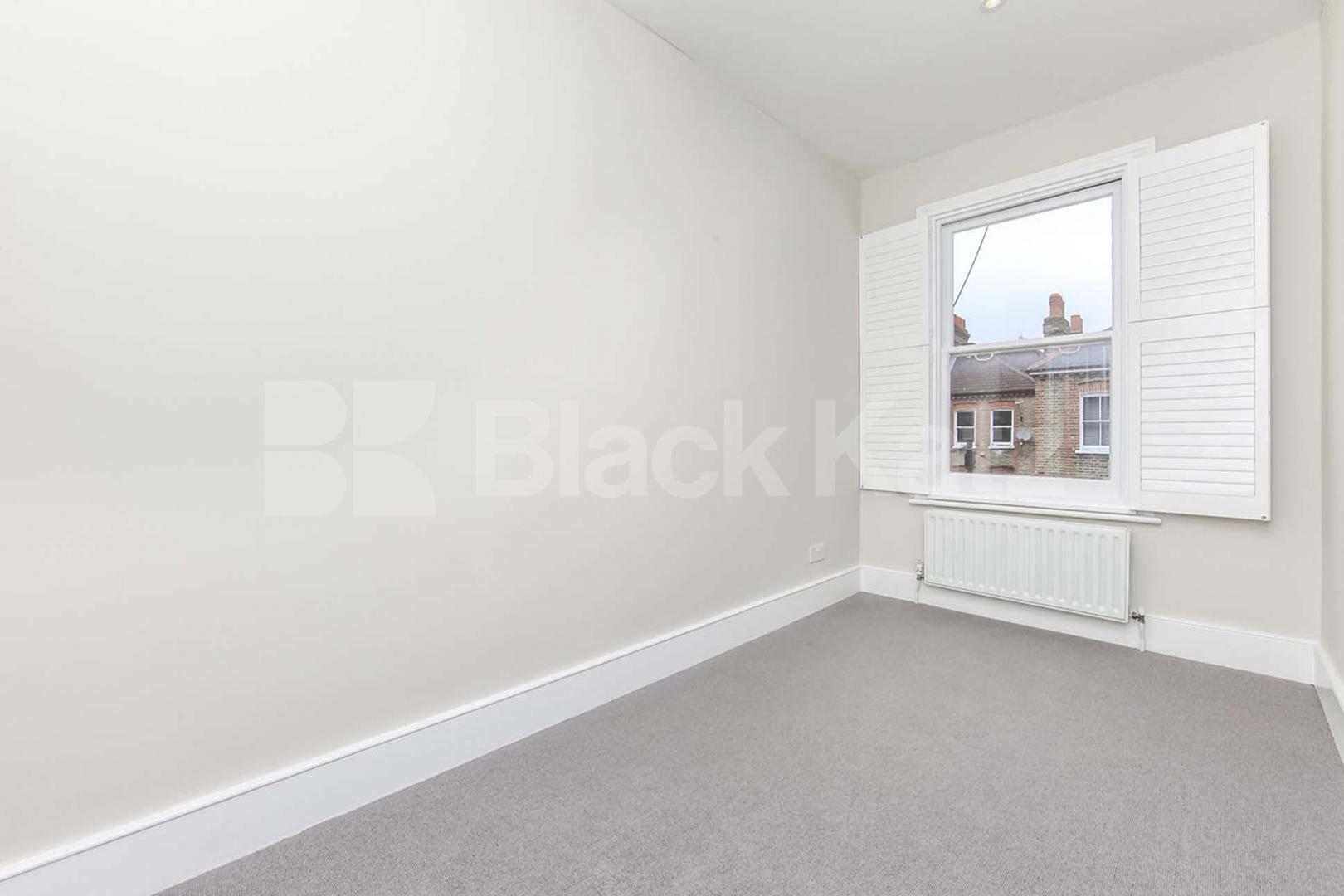 Triplex & offering 1160 Sq. Ft. of living & entertaining space Kendoa Road, Clapham