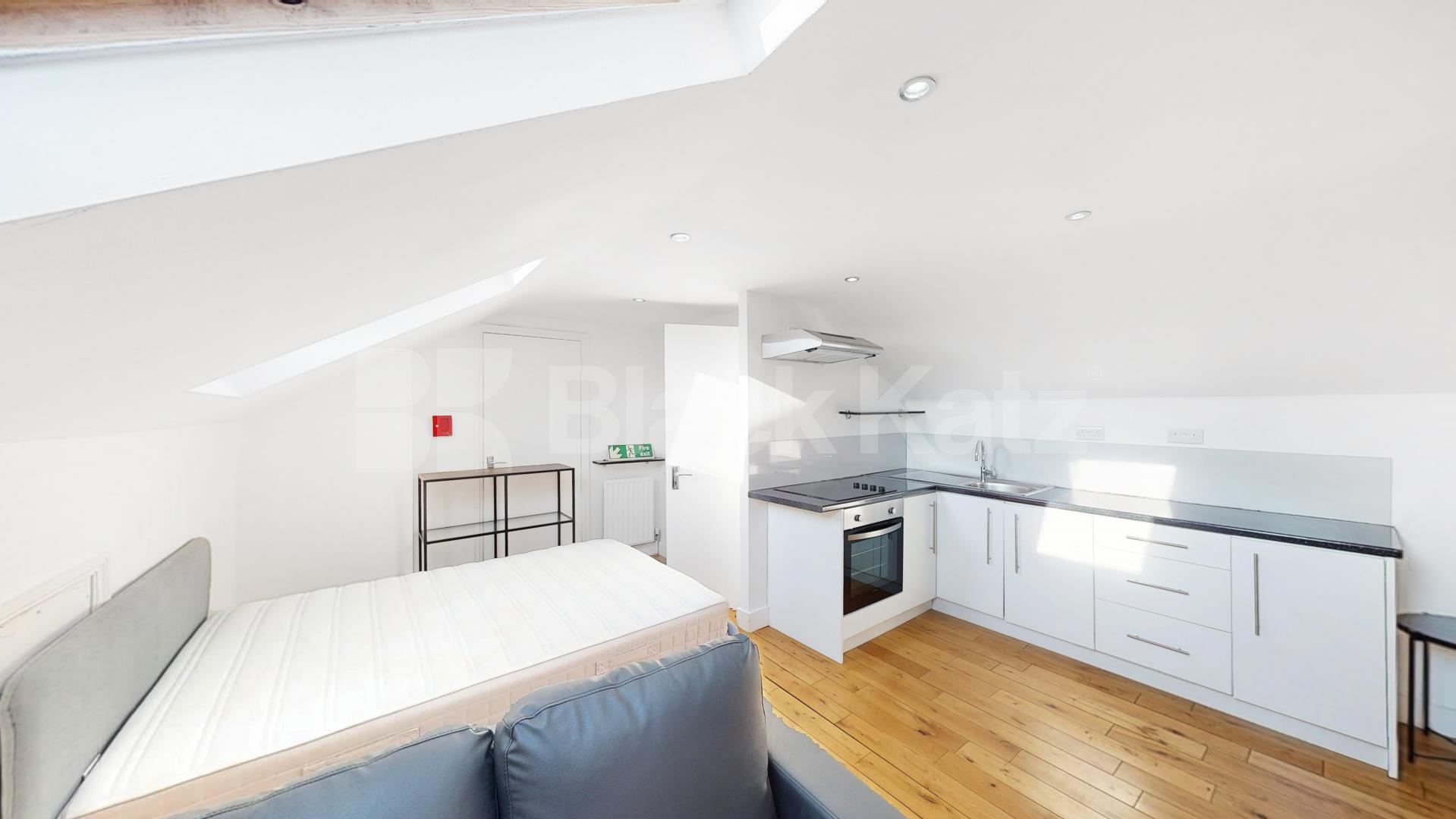 An excellent studio apartment set on the top floor of beautifully presented period building located on the border of West Hampstead and Kilburn.The property is flooded with natural light and is completed to a high standard throughout.You are ideally  Quex Road, London, NW6,  London
