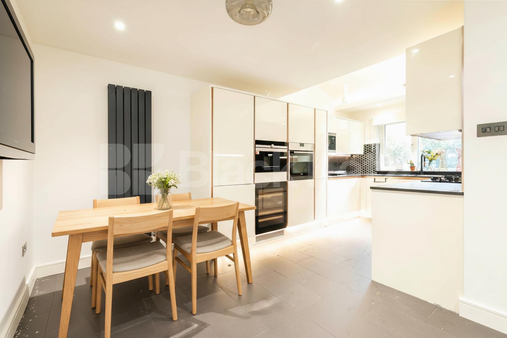 This beautifully presented three-bedroom split-level house is located on the sought-after Lennon Road in the heart of Willesden Green Marley Walk, London, NW2,  London