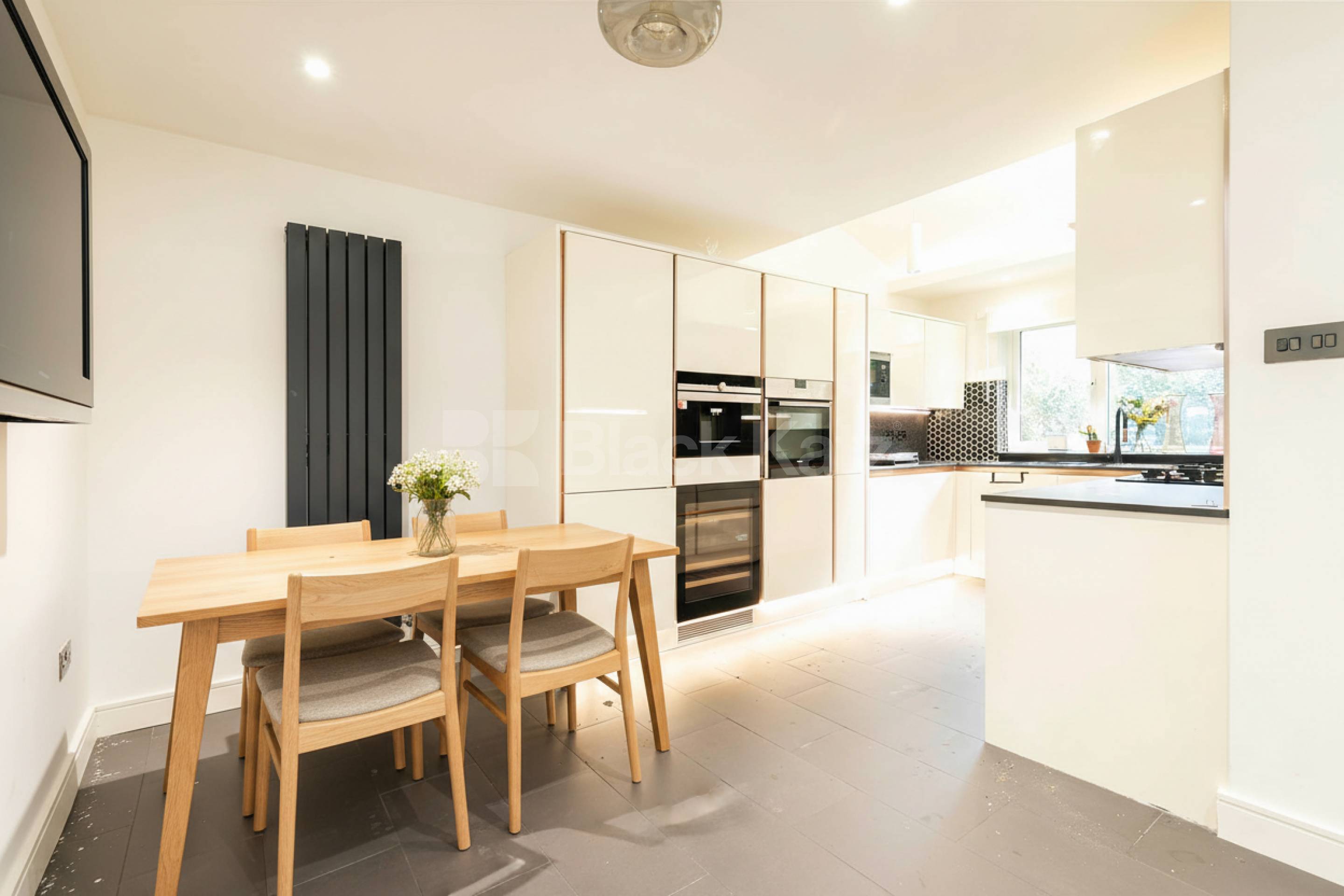 This beautifully presented three-bedroom split-level house is located on the sought-after Lennon Road in the heart of Willesden Green Marley Walk, London, NW2,  London NW2