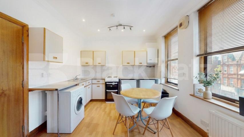 A well-presented three-bedroom split-level apartment located on Finchley Road, NW3 Finchley Road, Hampstead, NW3,  London