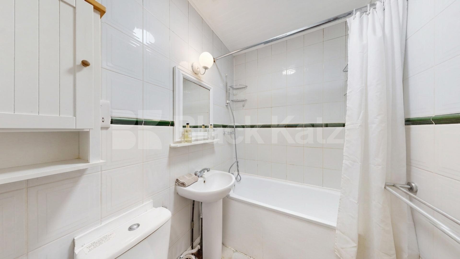 A well-presented three-bedroom split-level apartment located on Finchley Road, NW3 Finchley Road, Hampstead, NW3,  London