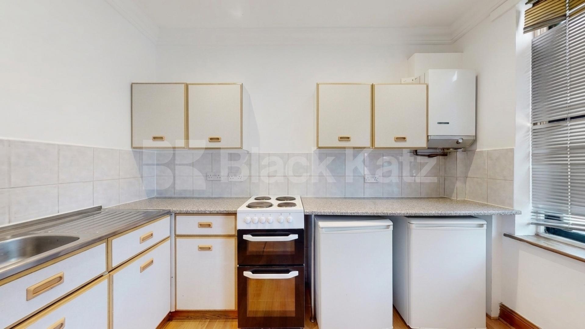 A well-presented three-bedroom split-level apartment located on Finchley Road, NW3 Finchley Road, Hampstead, NW3,  London