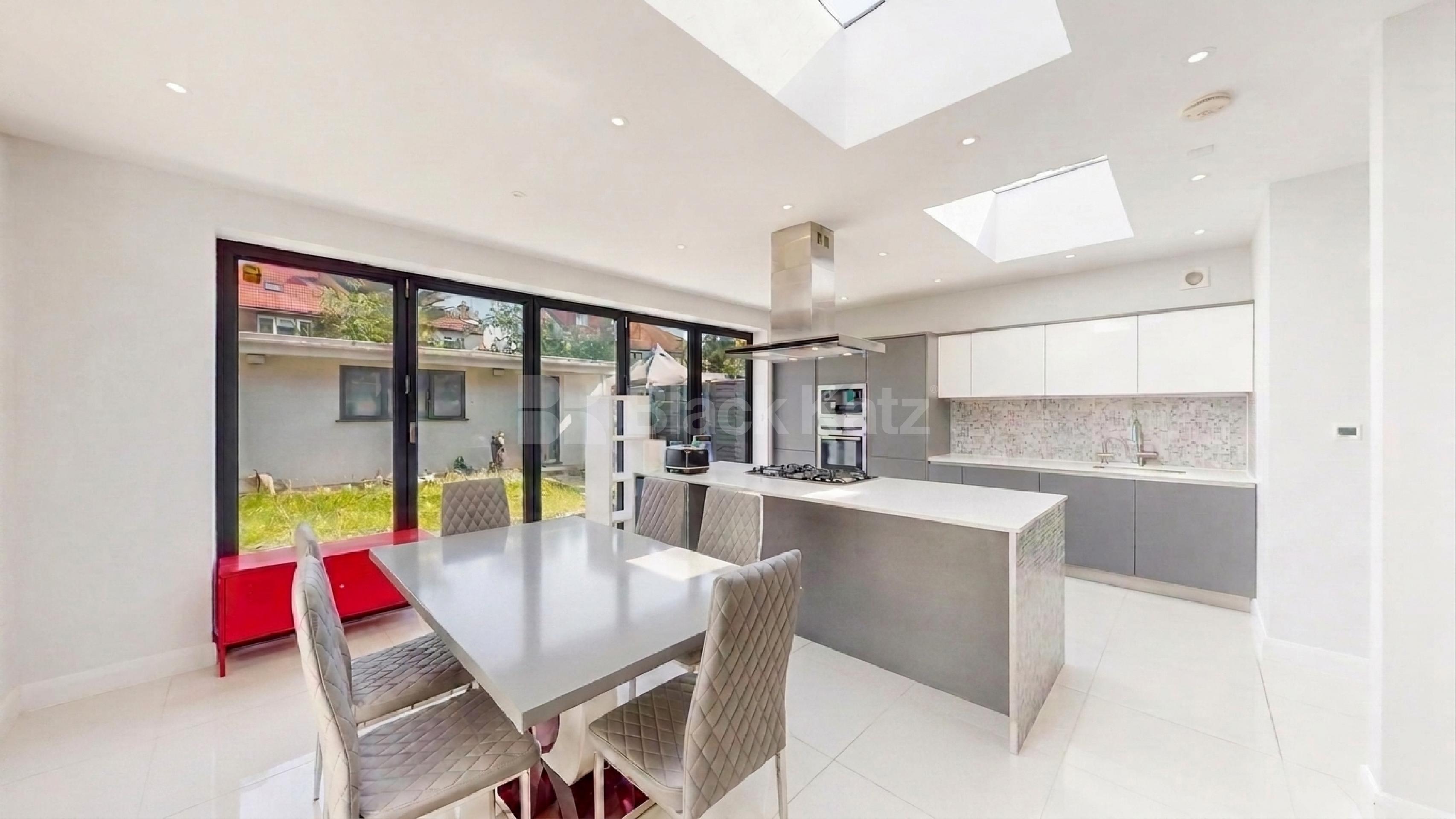 A superbly presented five-bedroom family home that has been renovated to a high standard throughout, offering spacious and contemporary accommodation in a sought-after location on Burnley Road, Dollis Hill, NW10.The property boasts a bright and spaci Burnley Road, London, NW10,  London NW10