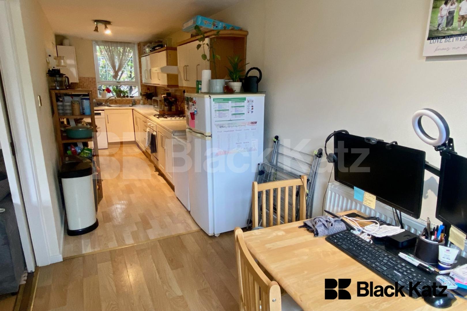 Spacious split level house with parking & charming patio garden Garratt Lane, Earlsfield