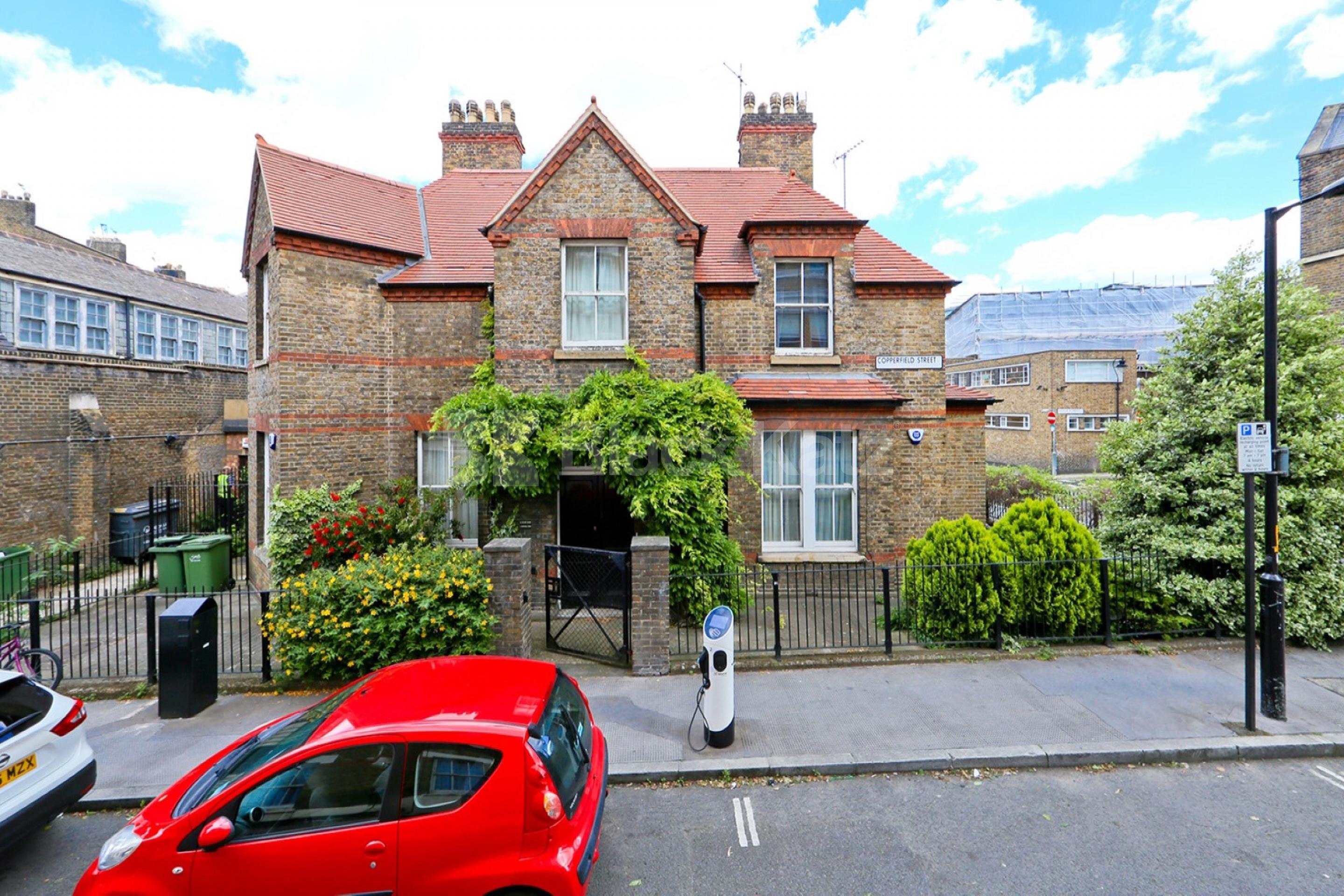 Rarely available duplex apartment with patio area in former converted vicarage   Copperfield St, Borough SE1