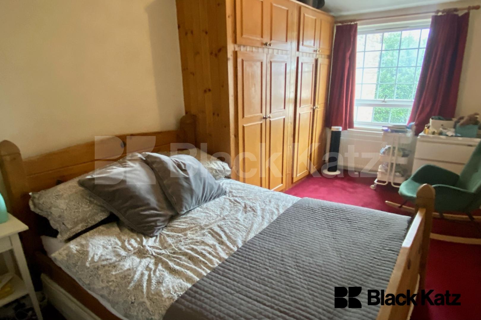 Spacious split level house with parking & charming patio garden Garratt Lane, Earlsfield