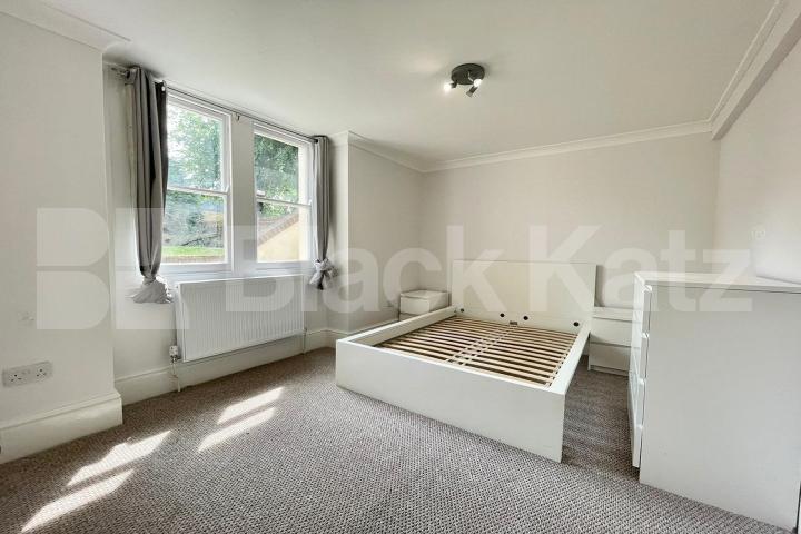 Spread over the ground floor of this stunning period building  Kings Avenue, Clapham