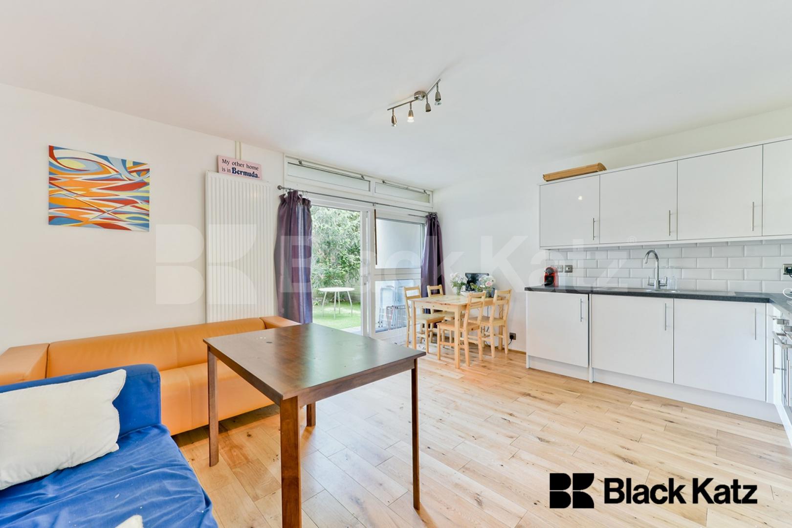 Arranged over two floors with tranquil garden Cedars Road, Clapham Common North Side