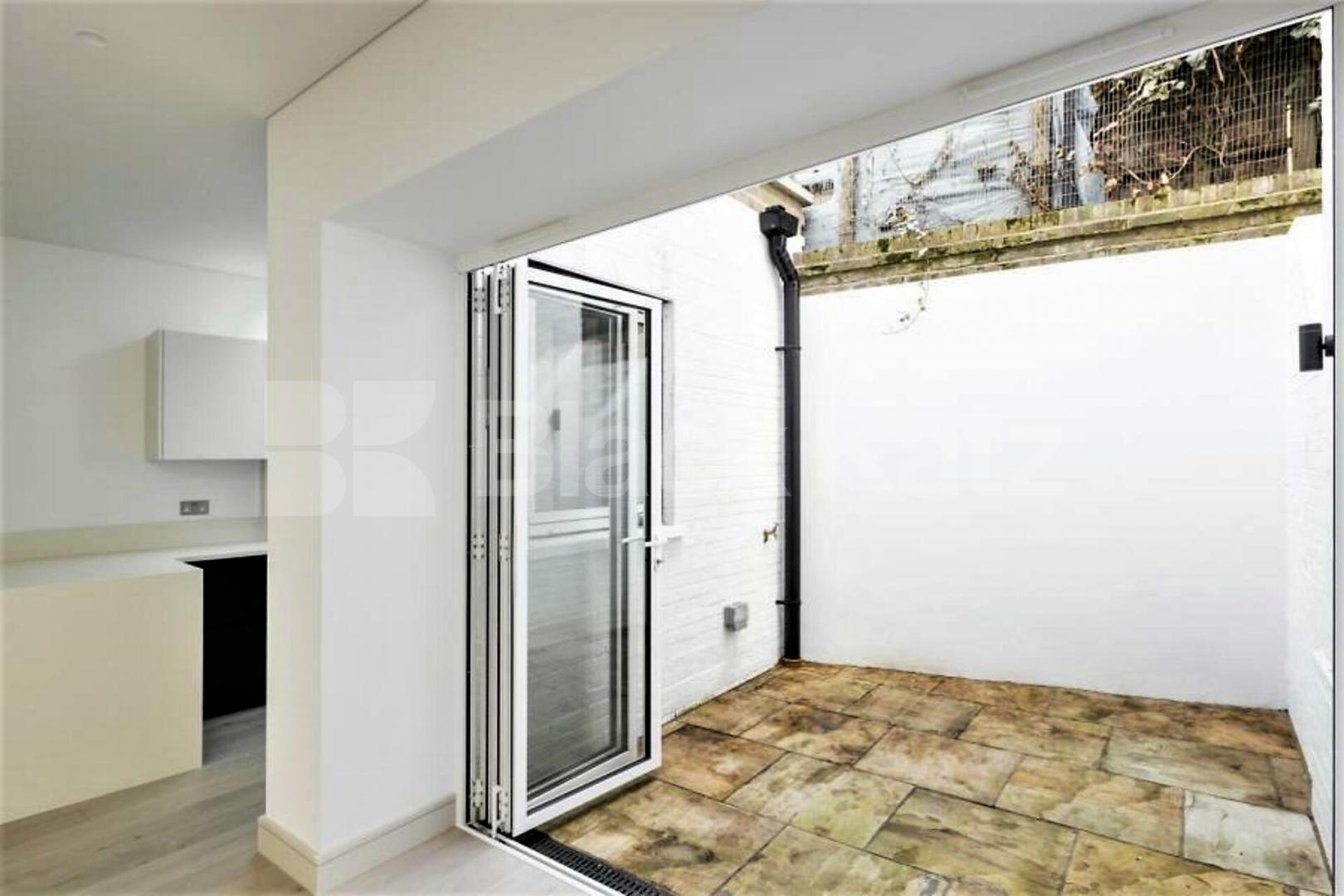 Luxury new 2 bed split level house with patio area in Kentish Town Raglan Street, Kentish Town